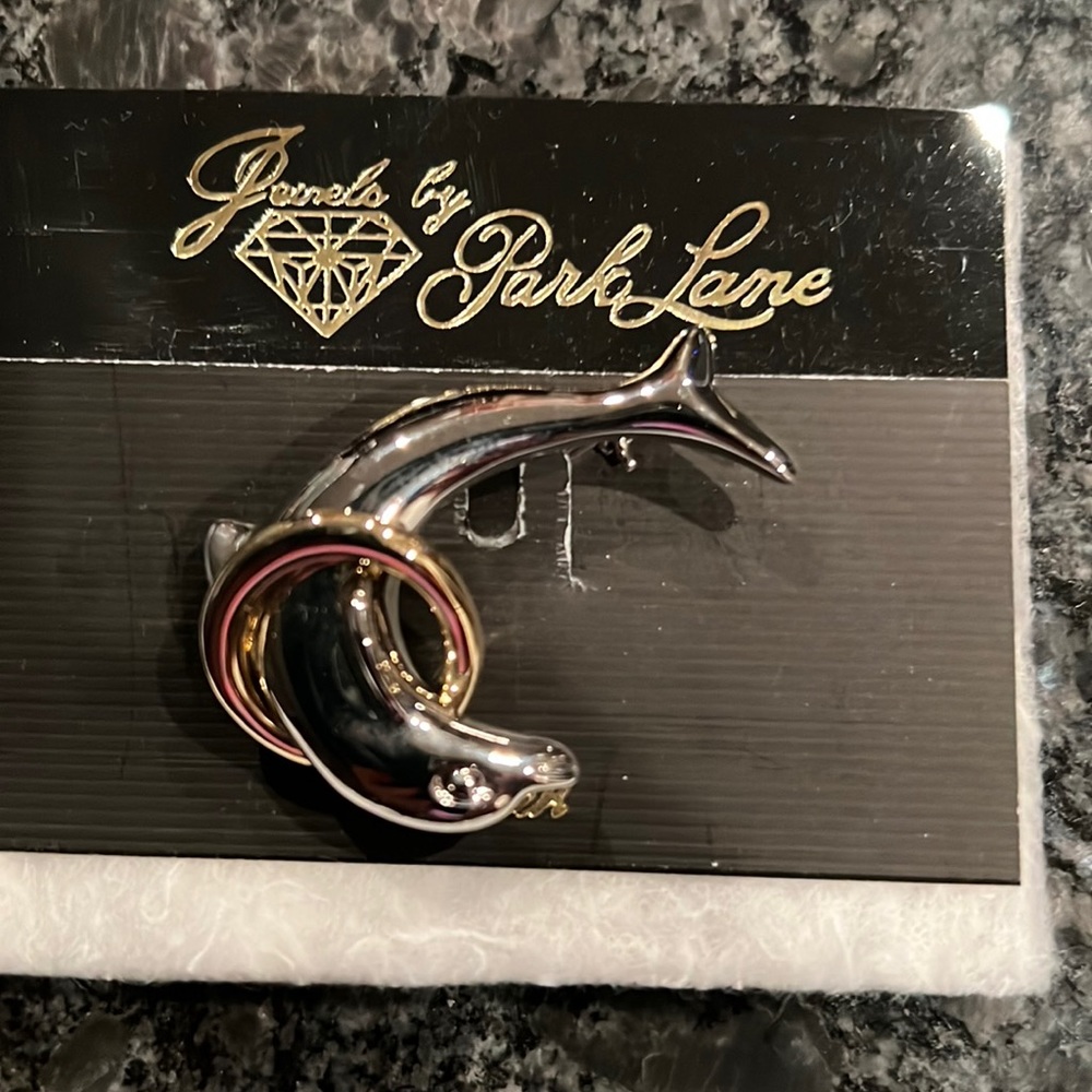 Jewels by Park Lane dolphin jumping through hoop brooch